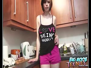 Busty teen in the kitchen