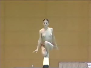 Former Olympian gymnast from Romania doing her exercises topless