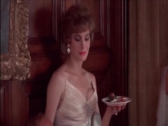 Sean Young MAking out involving the bloke inside the car round her nipple pops out of her dress. then Sean little rEmoving her fur coat, turning around to reveal her tits wHile talking to some people 